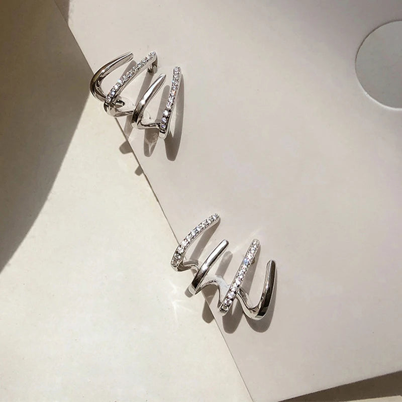 Brincos Boucles Griffe