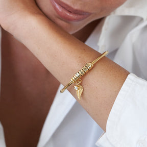 Pulseira Eternelle | Com Nome Gravado e Pingente de Asas